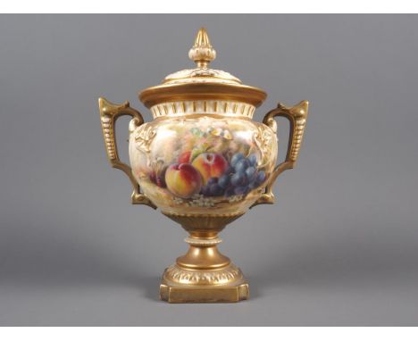 A Royal Worcester two-handle vase and cover with fruit decoration, by Ricketts, 10 1/2" high