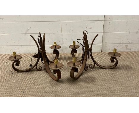 A pair vintage wrought iron three arm chandelier 