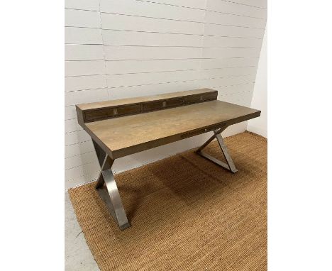 A light beech chrome desk with cross chrome legs and three drawers (H88cm W160cm D80cm)