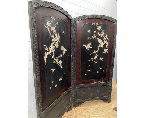 A late 19th century Japanese black laquered screen with mother of pearl and bone bird details. Signed.  AF Each panel 183 x 8