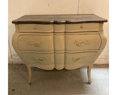 A Louis XV style Bombe commode with three drawers on splayed legs (H89cm W104cm D56cm)