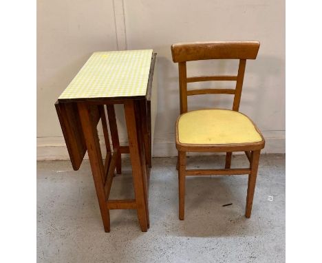 A Formica gate leg kitchen table and single chair 