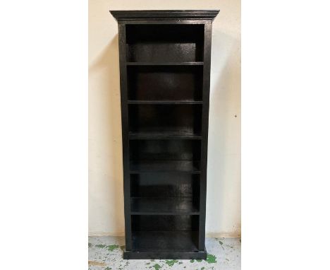 A black painted six shelf book case (H263cm W80cm D34cm)