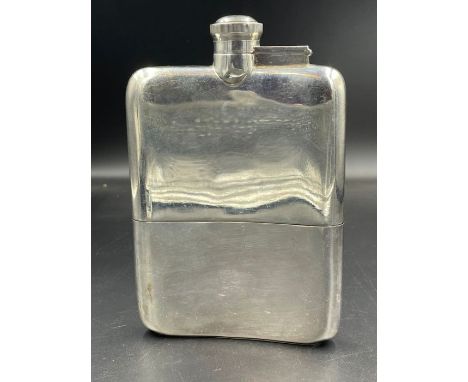 A silver hip flask by James Dixon &amp; Sons Ltd, Sheffield 1927 for Rowell of Oxford.
