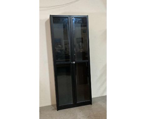 A black painted glass fronted five shelf display cabinet (H202cm W79cm D30cm)
