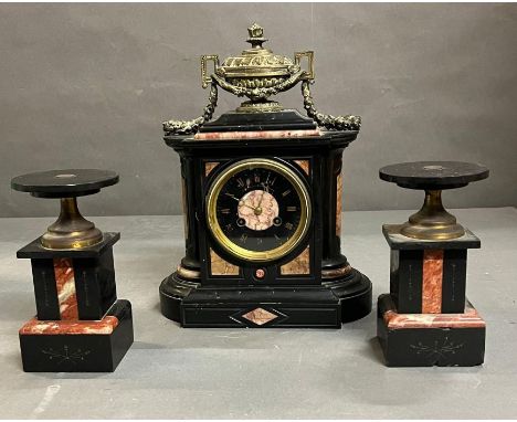 A Connell London slate and marble three piece mantel garniture, mantle clock with two candle holders plinths 