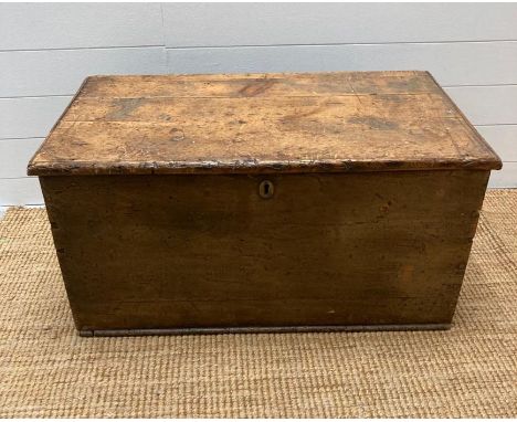 An oak three panelled top trunk with wrought iron handles. (88cm W x 50cm d x 44cm H) 