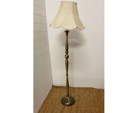 A steel based floor lamp 