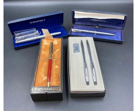 A selection of fountain pens, roller ball and propelling pencils to include Cross Papermate and Sheaffer