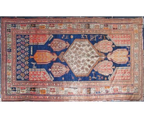 An antique Shirvan- Azerbaijan - North West Persia (Iran), hand made carpet in blue and red colours, 137X235cm, having a date