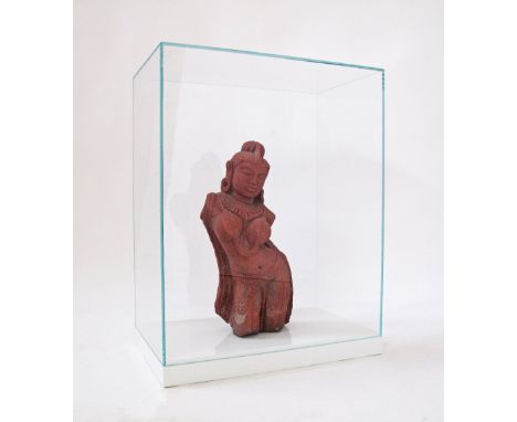 A Cambodian ceramic dancer in a glass display box. The box H64cm, 50X30cm.