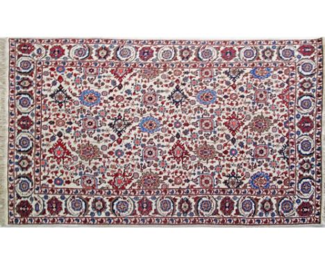 A beige background allover design triple border Persian carpet, mid 20th century, 195x300cm.