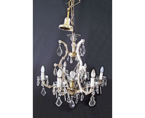 A six light crystal chandelier. W70cm.