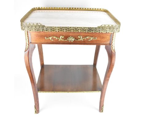 A mid 20th century French style side table, having a marble top with a pierced gilt metal gallery above a gilt metal frieze d