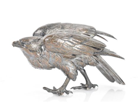 A circa 1900 silver plated bronze sculpture of a bird, in a standing pose about to take flight, unmarked, 12cm high x 21cm wi