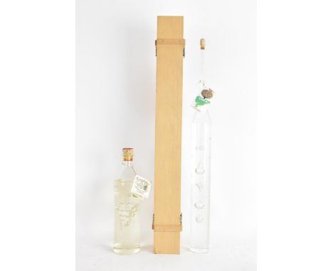 Two bottles of Peter Schreiber Grappa Etter to include an elongated 70cl bottle in a fitted boxIf there is no condition repor