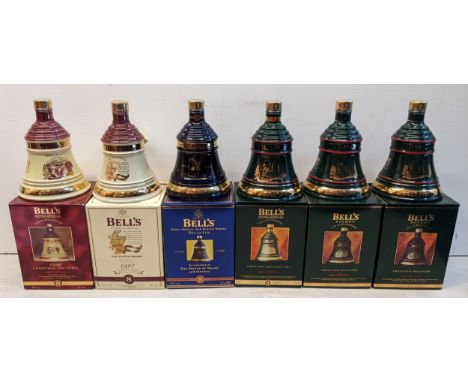 Six boxed Bell's Scotch Whisky Decanters, to include five Christmas decanters, years 1992, 1993, 1995, 1996, 1997, along with