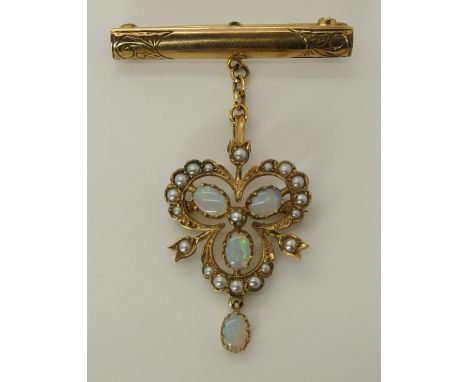 An Edwardian style opal and pearl pendant brooch both parts of the brooch hallmarked London 1994, length from bar top to bott