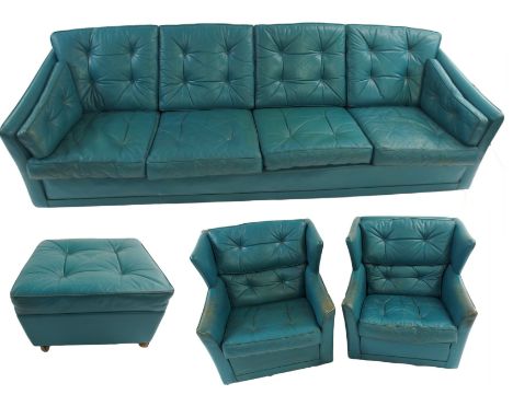 A 1960's Wylie and Lochhead Danish style blue leather button back suite comprising; four seater sofa, 80cm high x 260cm wide 