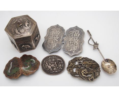 A Chinese white metal belt buckle cast with calligraphy, 2oz, 8cm x 4.5cm, a silver oval brooch decorated with figures stampe