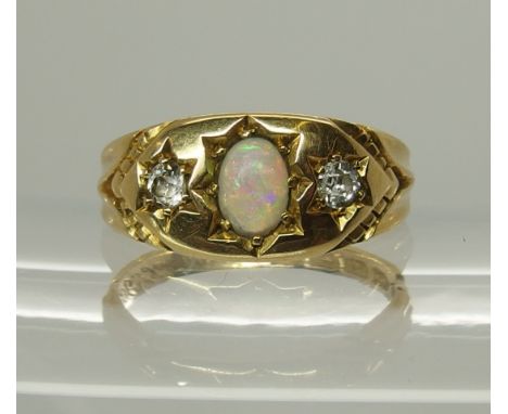 An 18ct gold opal and diamond ring hallmarked Birmingham 1902, finger size J, weight 3.8gms