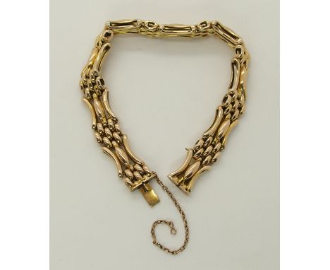 A 15ct gold gate bracelet length 19.5cm, weight 22.2gms