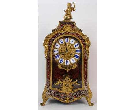 A Napoleon III silvered and brass inlaid boulle tortoiseshell mantle clock circa 1880, in Louis XIV style, the case surmounte