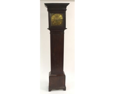 An oak longcase clock the brass face inscribed John Wawn Kr., Moorside, the scrolling spandrels enclosing Roman numeral chapt