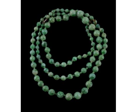  A graduated jadeite jade bead necklace,   the two strands composed of polished jadeite jade beads, on a knotted thread, 41cm