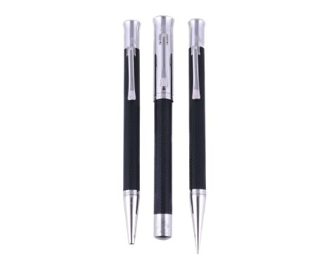  Graf Von Faber-Castell, a black fountain pen, rollerball pen and propelling pencil,   the fountain pen cap with clip, the me