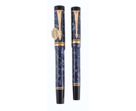  Parker, Duofold, Centennial, a blue marble fountain pen,   with a blue marble cap and barrel, the medium nib stamped 18K , i