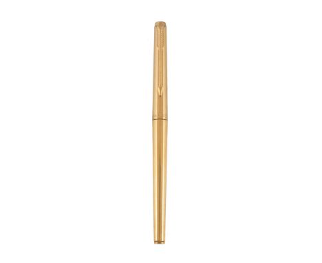  Parker, a gold plated fountain pen,   with reeded decoration, the cap with an arrow clip and engraved   W. Boomacken  , cart