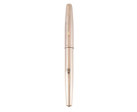  [Royal Interest] Parker, 61, a gold plated fountain pen,   with reeded decoration, the cap with an arrow clip, the barrel en