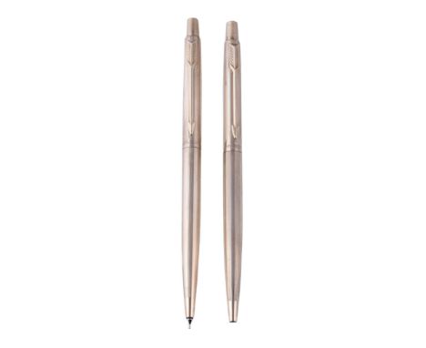  Parker, Insignia, a rolled gold ballpoint pen and propelling pencil,   with striated decoration and arrow clips, in a Parker