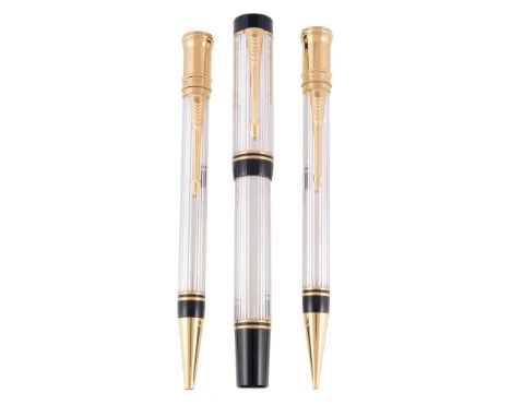  Parker, Duofold, Centennial, a silver plated fountain pen, ballpoint and propelling pencil set,   with reeded decoration, th