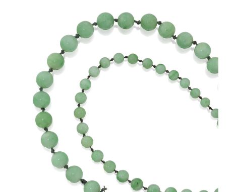 comprising of ninety-nine graduated jade beadslength 90cmThe necklace is in fair condition and would need to be restrung, It 