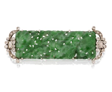 the rectangular carved and pierced jade plaque depicting fruits, terminating to scrolls set throughout with eight-cut and bag