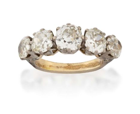 the graduated old cut diamonds in white claw settings, to a yellow tapered shoulder plain polished shank, total estimated dia