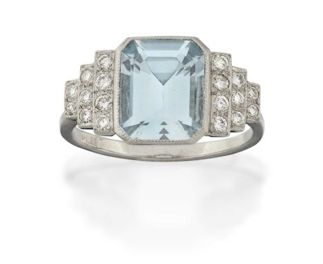 the emerald-cut aquamarine to stepped shoulders inset with round brilliant cut diamonds, in white millegrain settings, to a p