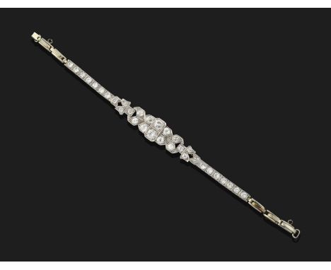 the central geometric plaque set throughout with old cut diamonds, to articulated square links inset with round brilliant cut