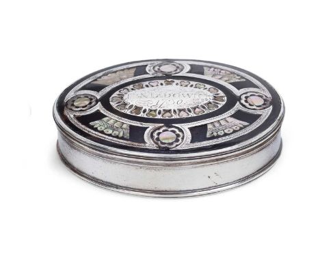 oval, the pull-off cover with reeded silver rim and a mother-of-pearl and silver inlaid tortoiseshell panel, centrally engrav