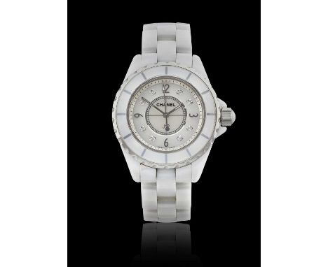 quartz battery driven movement, mother of pearl dial with Arabic and diamond set hour markers, case with protected screw down