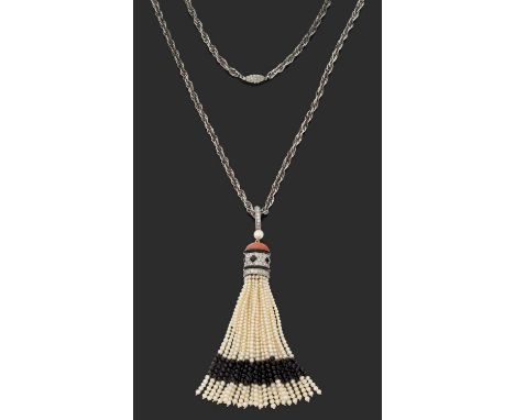 the seed pearl tassels with a band of onyx beads and seed pearl terminals, gathered by a coral, onyx and diamond bombé cap, d