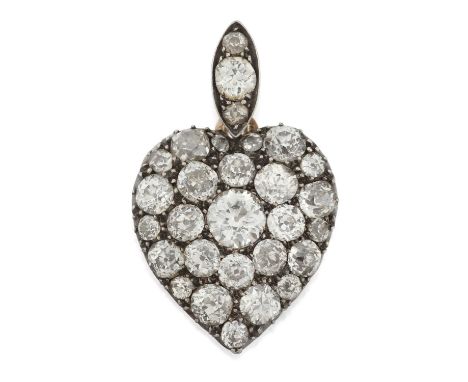 the heart set throughout with old cut diamonds, in white pavé settings, suspended from a similarly set bale, with a locket co