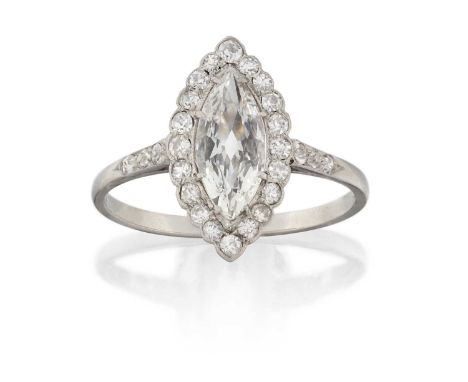 the marquise cut diamond within a border of eight-cut and old cut diamonds, in white claw and millegrain settings, to old cut