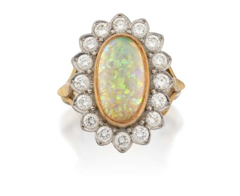 the oval cabochon opal in a yellow rubbed over setting, within a border of round brilliant cut diamonds in white claw setting