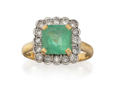 the emerald-cut emerald in a yellow four claw setting, within a border of eight-cut diamonds in white millegrain settings, to