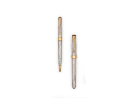each tapering and with an engine-turned chevron finish, with gilt highlights and arrow-form clip13.5cm long and smallerEach p