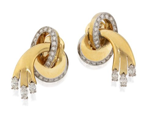 the yellow plain polished scroll motifs with round brilliant cut diamond detailing throughout and terminating to marquise cut