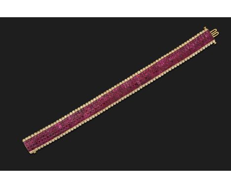 four rows of pavé set calibré cut rubies flanked by round brilliant cut diamonds, in yellow bar and rubbed over settings, tot